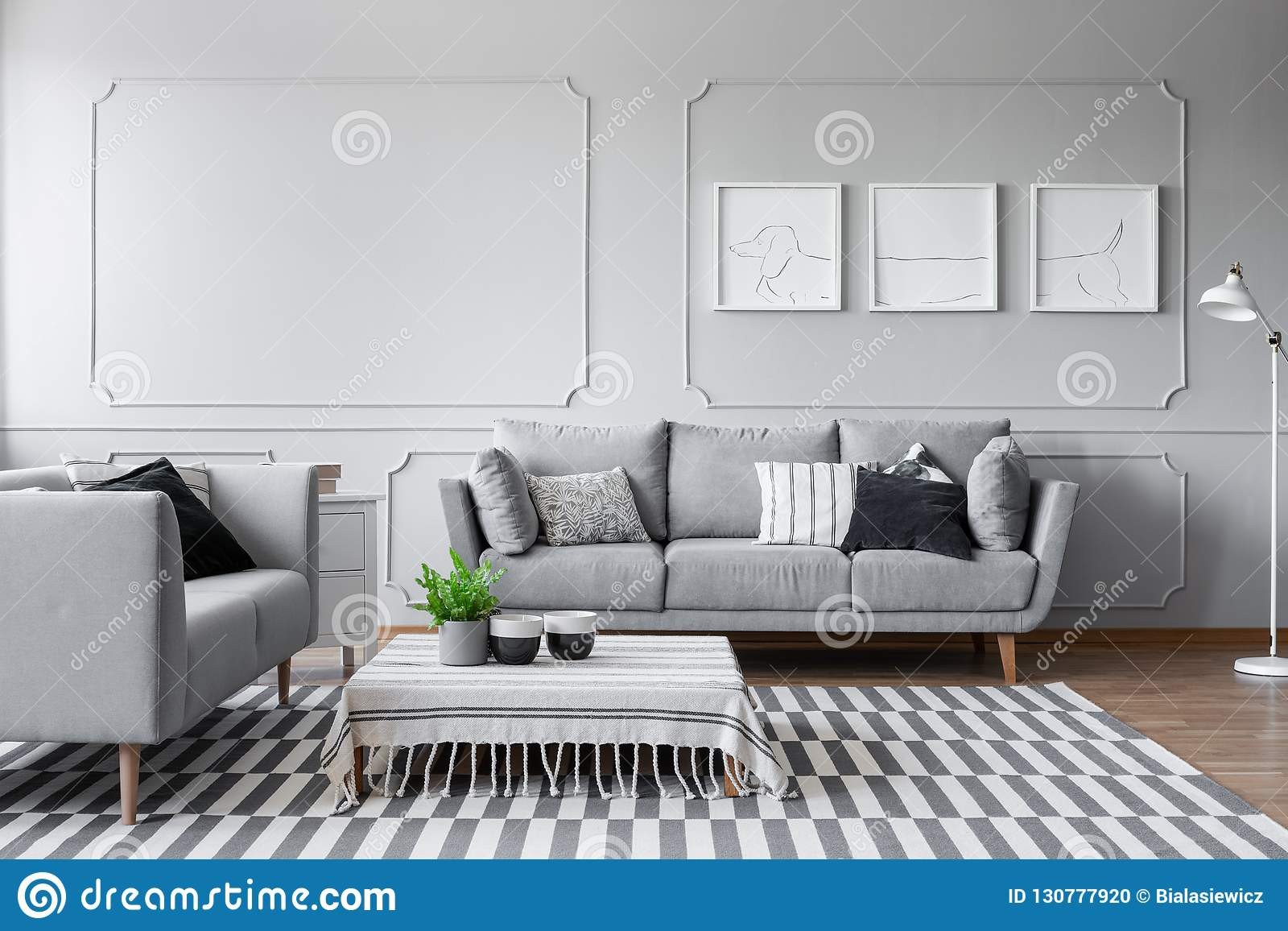 Comfortable Elegant Living Room New Elegant Living Room with Two fortable Grey sofas with Pillows and Graphic the Wall Stock