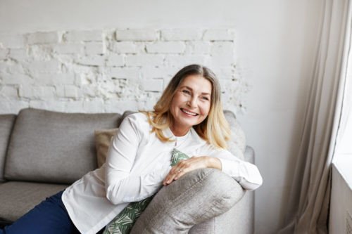 Comfortable Living Roomfor Movie Watching Luxury Indoor Shot Of Happy Senior Caucasian Woman Relaxing at Home Sitting On fortable sofa In