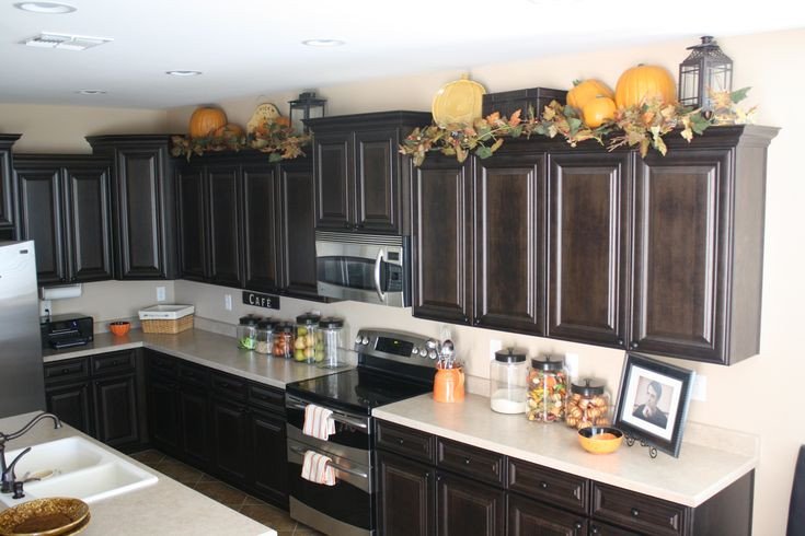 lanterns on top of kitchen cabinets Decor ideas